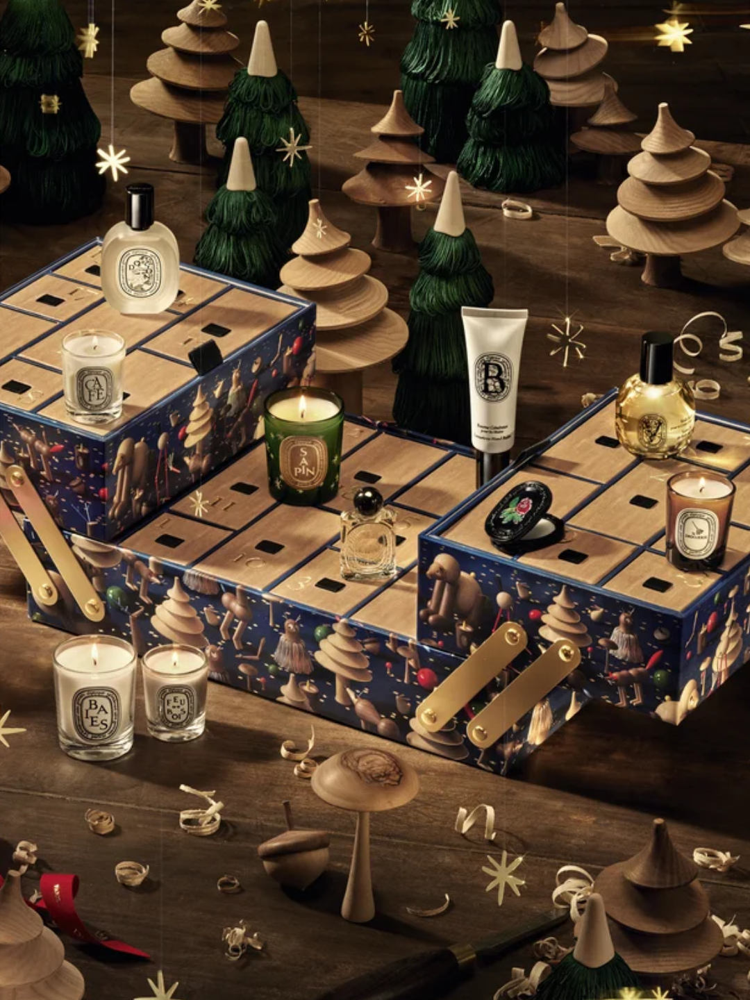 An advent calendar from Diptyque with scented candles, body care, perfumes, and more