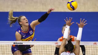 Elles Dambrink (L) of Netherlands spikes the ball against Helena Cazaute (R) and Amandha Sylves (R|) of France during the Women's 2025 Volleyball Nations League - Belgrade match between France and Netherlands on June 20, 2025 in Belgrade, Serbia.