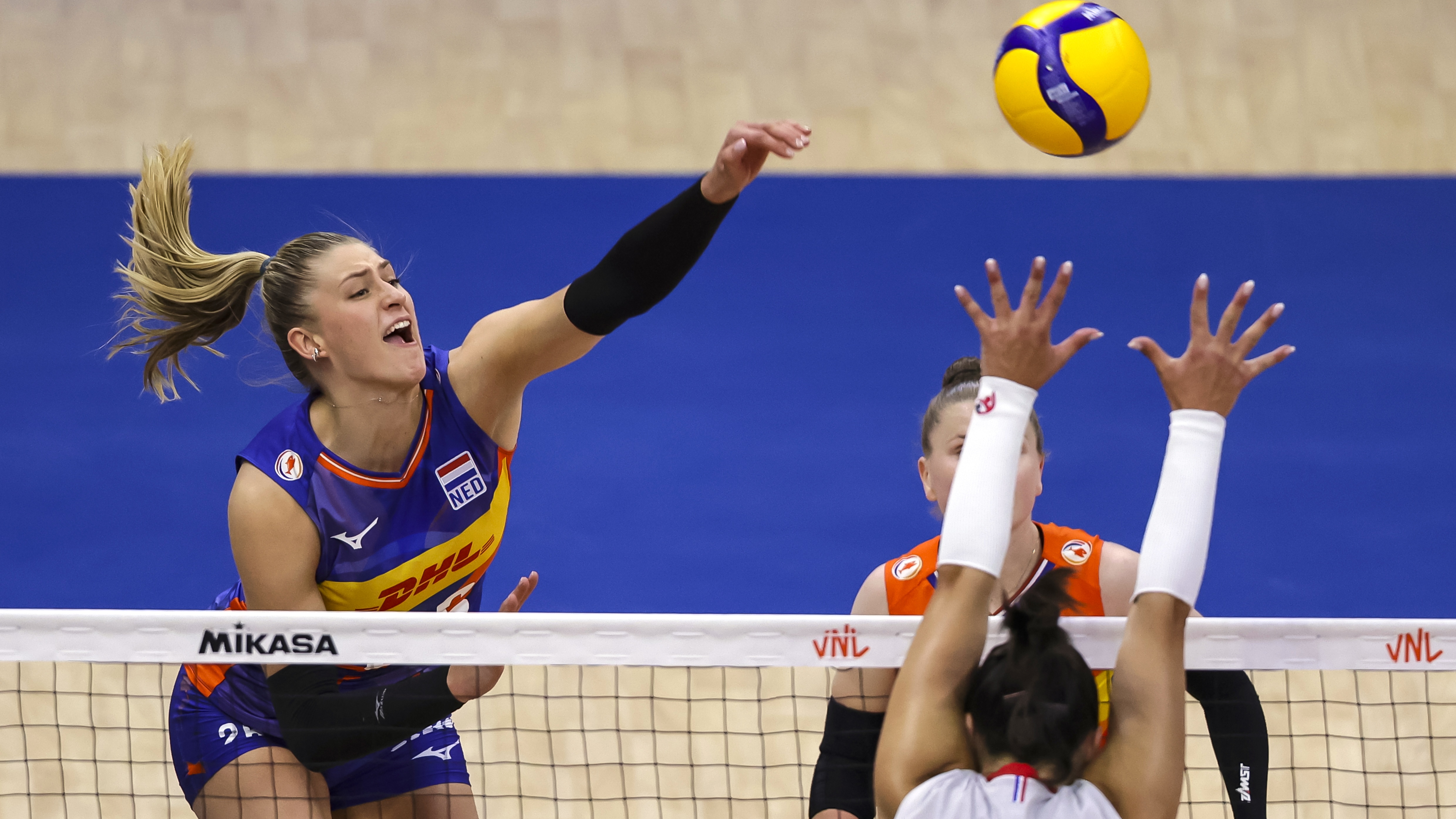Elles Dambrink (L) of Netherlands spikes the ball against Helena Cazaute (R) and Amandha Sylves (R|) of France during the Women&#039;s 2025 Volleyball Nations League - Belgrade match between France and Netherlands on June 20, 2025 in Belgrade, Serbia. 
