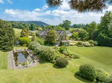 More than 10 acres of delightful gardens and grounds create a secluded setting for charming Chapel House near Dorking, Surrey © Knight Frank