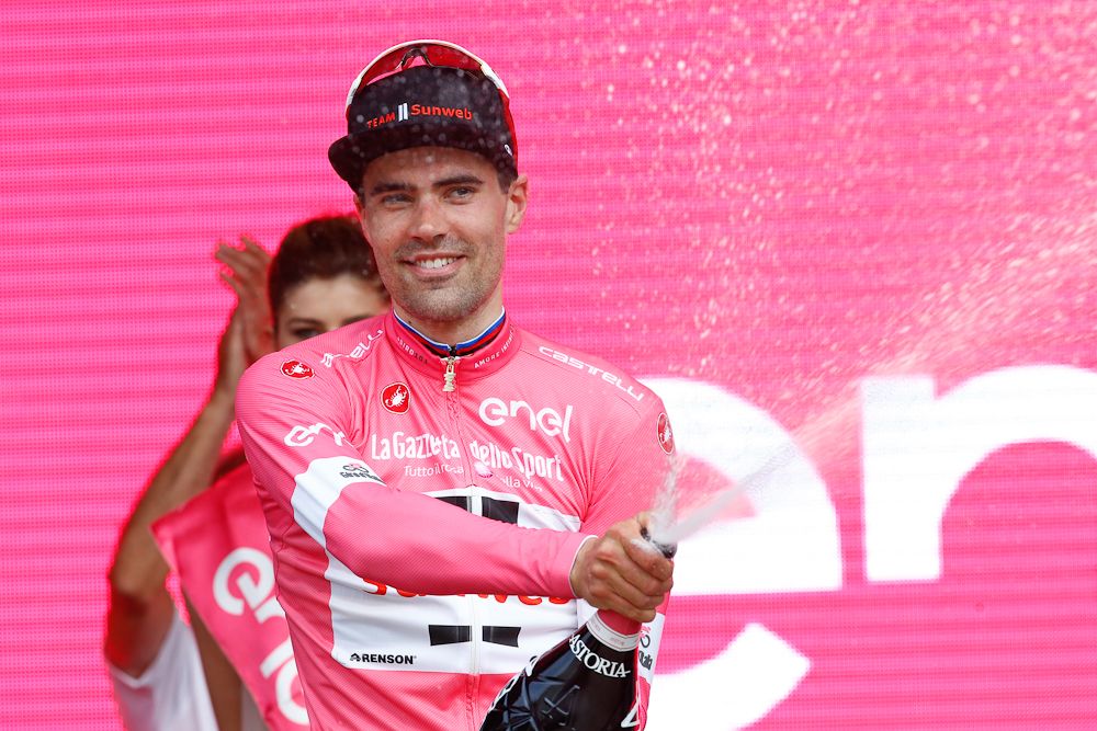Tom Dumoulin celebrates after winning the opening time trial at the 2018 Giro d'Italia