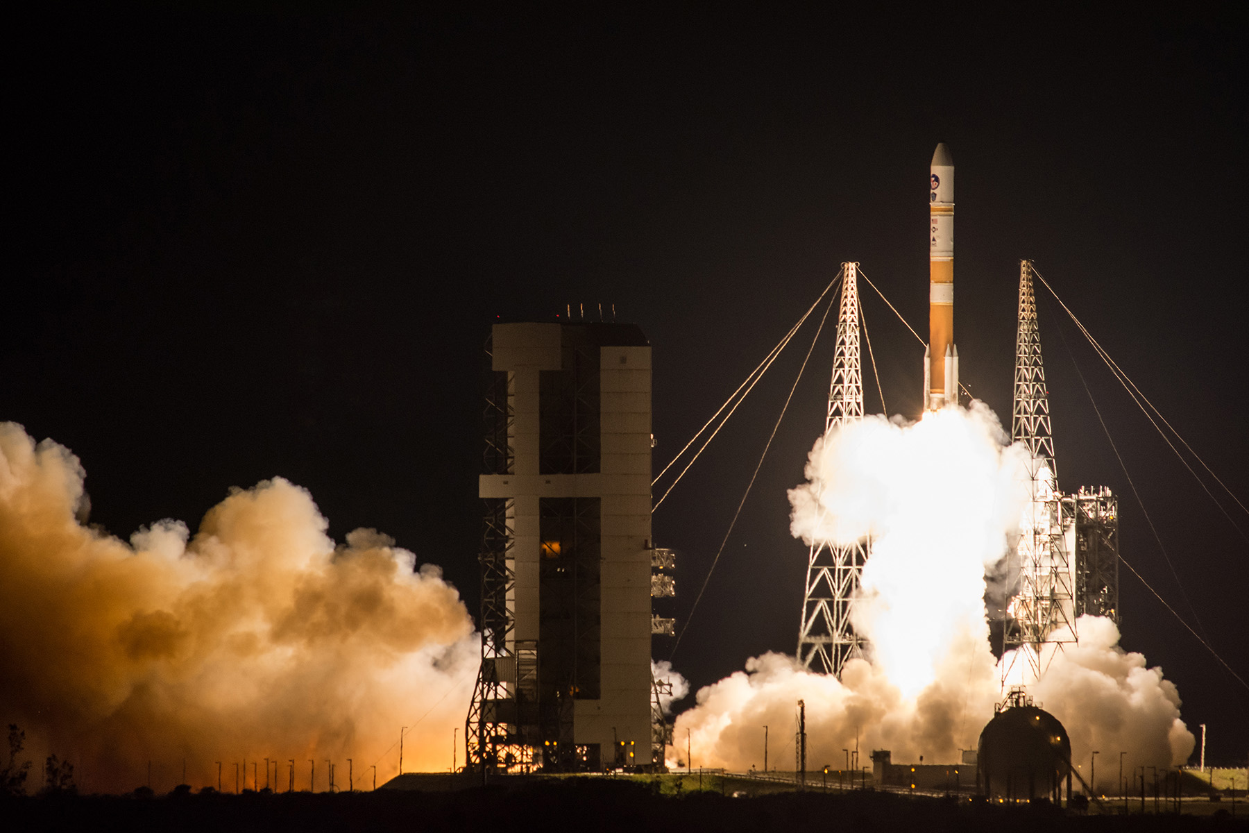 A United Launch Alliance Delta IV rocket carrying the Wideband Global SATCOM 9 communications satellite for the U.S. military lifts off from Space Launch Complex-37 of Florida&#039;s Cape Canaveral Air Force Station at 8:18 pm ET on March 18, 2017.