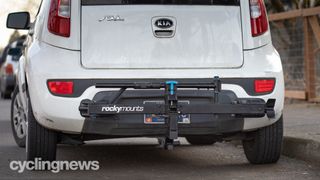 Rockymounts MonoRail Solo hitch bike rack fitted to a white KIA car