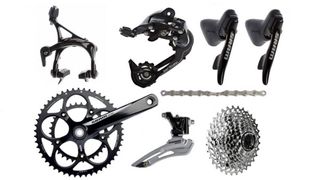 Black SRAM components making up a full groupset, on a white background