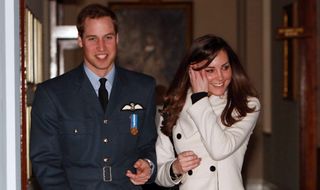 Prince William walks with his girlfriend Kate Middleton after his graduation ceremony at RAF Cranwell on April 11, 2008