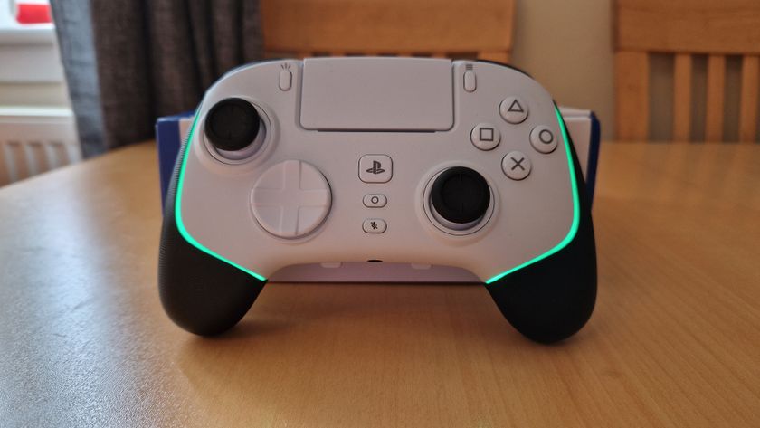 Razer Wolverine V2 Pro review image showing the controller form the front with the RGB Chroma lights on green