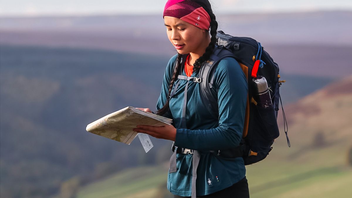 Woman wearing Smartwool Women’s Classic All-Season Merino Base Layer Long Sleeve on the trail