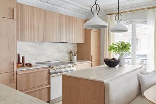 a modern kitchen with corian countertops