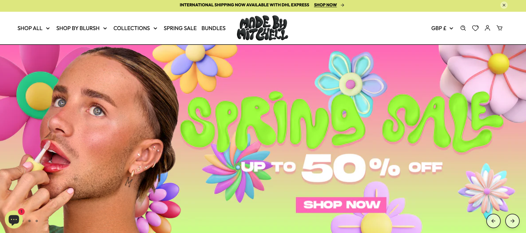 Made by Mitchell screenshot with man putting on lipgloss and spring sale banner