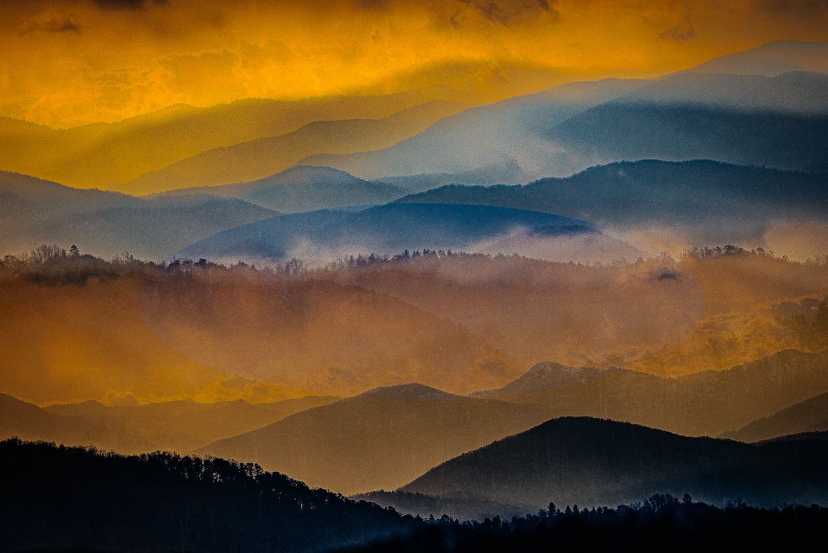 Image of mountainous landscape receding into mist from Here I Am exhibition
