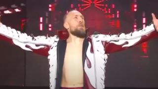 Bryan Danielson with his arms outstretched in AEW