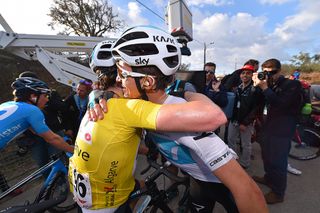 Geraint Thomas hugs Michal Kwiatkowski after stage 5 at Volta ao Algarve