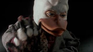 Howard the Duck beating a street punk in Howard the Duck