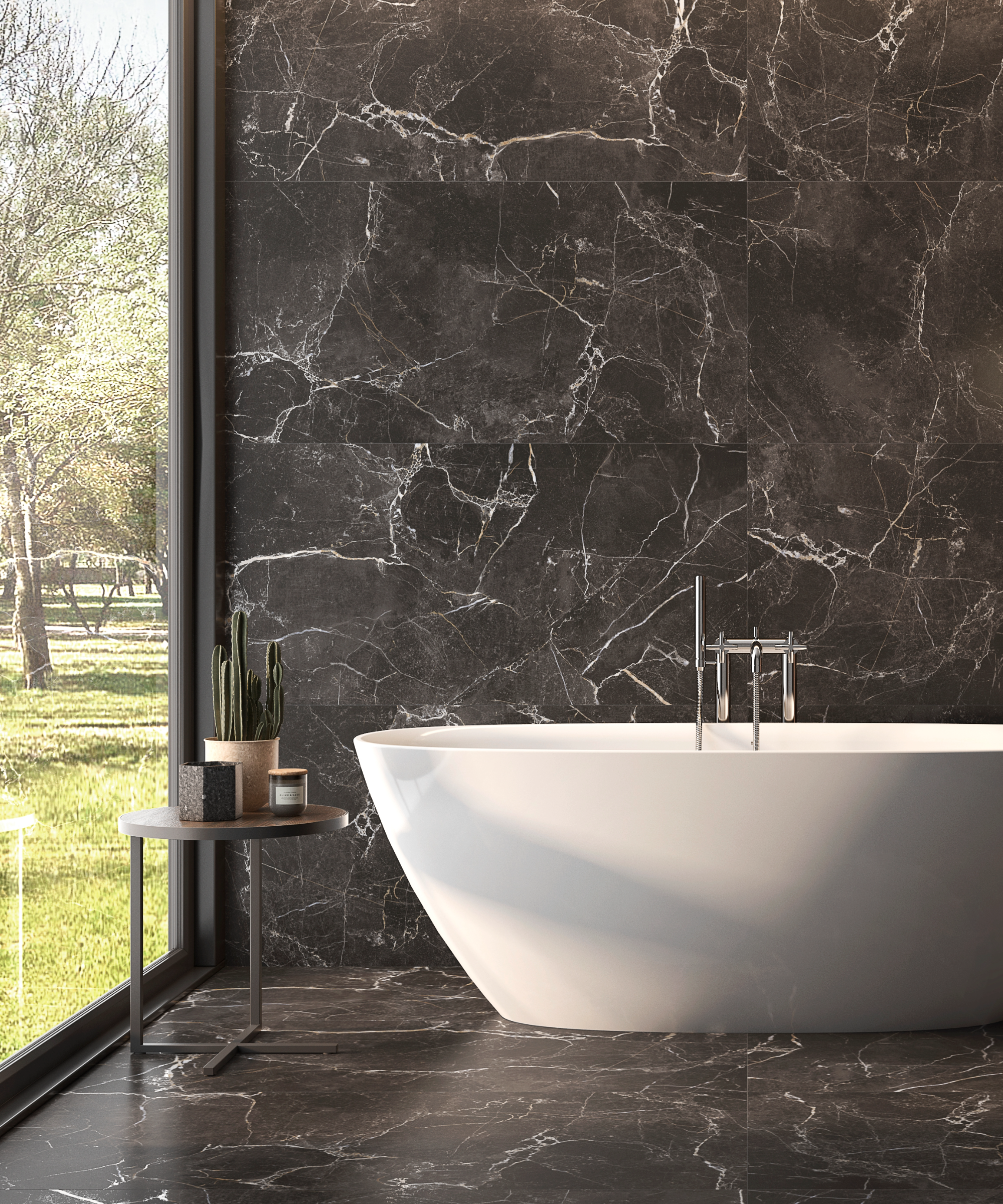 Dark bathroom idea with waterfall effect black marble tiling and freestanding bath