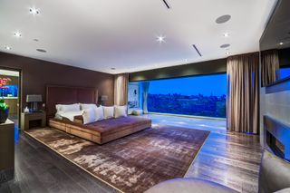 Master bedroom with balcony and views in Bel Air