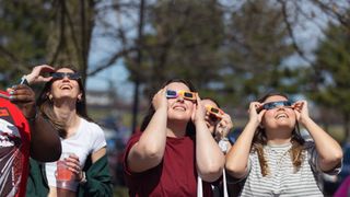 Students and spectators observe a total solar eclipse from SUNY Potsdam, New York on April 8, 2024