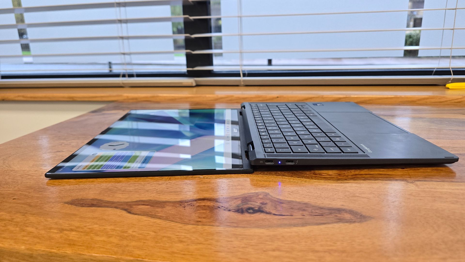 Acer Googlebook 14 on a wooden desk in an office