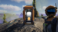 A Satisfactory player takes a selfie with the new portable toilet spawn-point. Yes, you read that correctly.