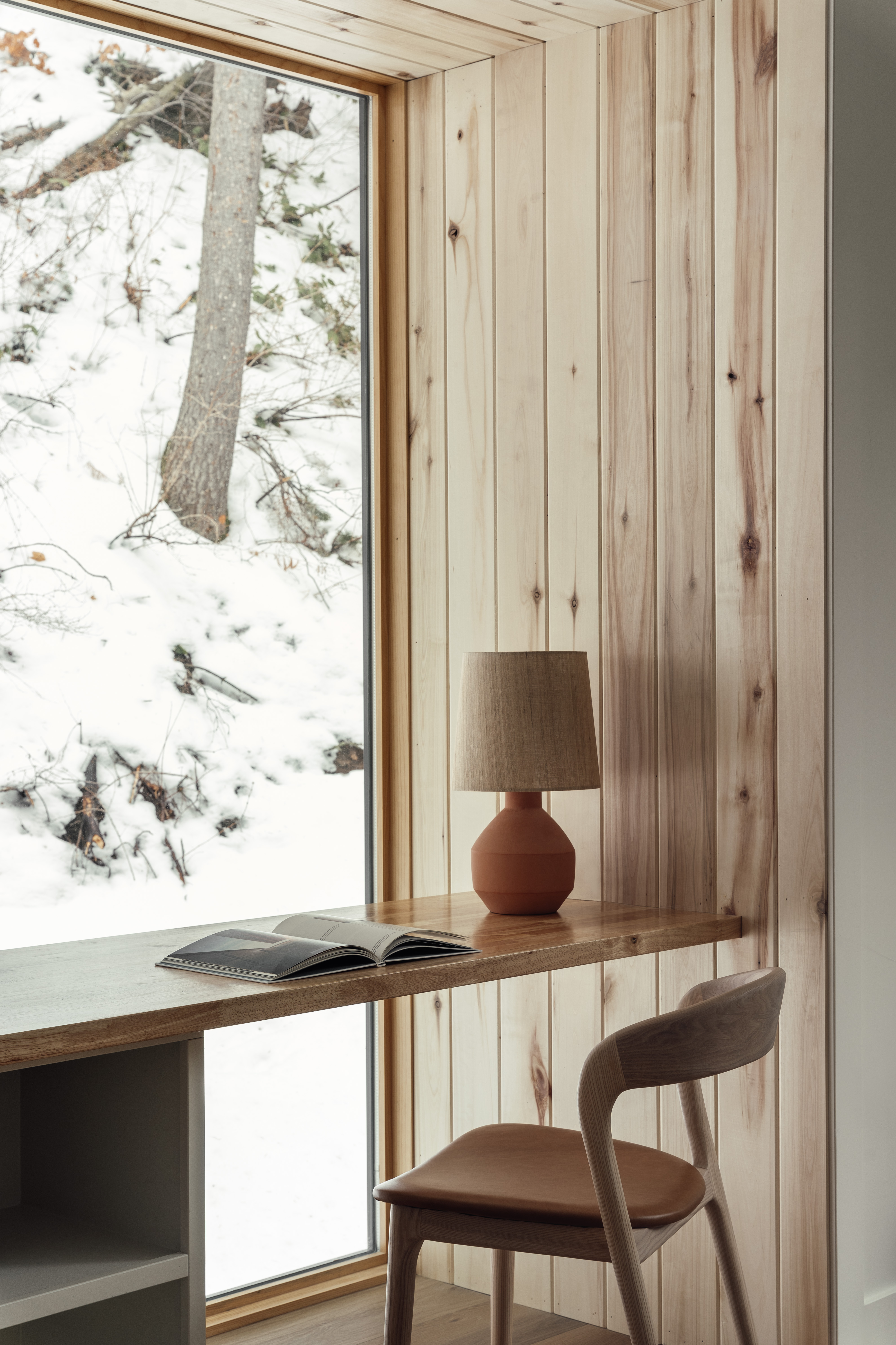 Parkview Mountain House by Mattaforma, a wooden house in a forest, snowy views