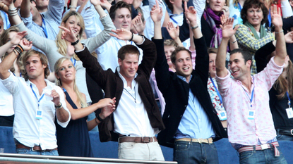 Their Royal Highnesses Prince William (2nd R) and Prince Harry (C) and guest Chelsy Davy (2nd L) watch Rod Stewart perform during the Concert for Diana at Wembley Stadium on July 1, 2007 in London, England. The Concert falls on the date that would have been the late Princess's 46th birthday and marks 10 years since her death with an event headed by Princes William and Harry to celebrate her life.