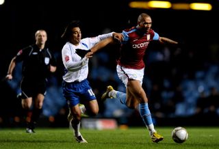 Can you identify the iconic Aston Villa forward?