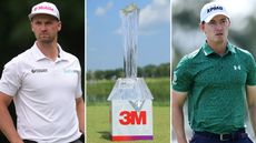 Wyndham Clark and Maverick McNealy stare on, with the 3M Open trophy in the middle