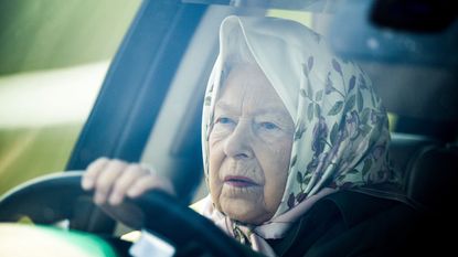 Queen wears bold red lipstick driving around Sandringham 