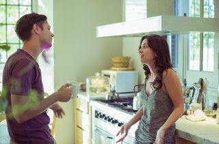 couple in kitchen arguing