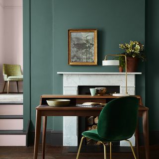 wooden study desk with green chair