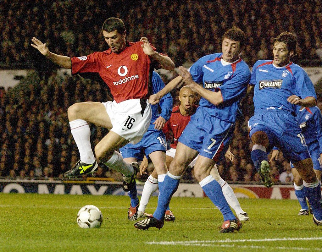 Manchester United&#039;s Roy Keane and Rangers Shota Arveladze (7) in tonight&#039;s UEFA Champions League clash at Old Trafford, Manchester, United Kingdom 04 November 2003. 