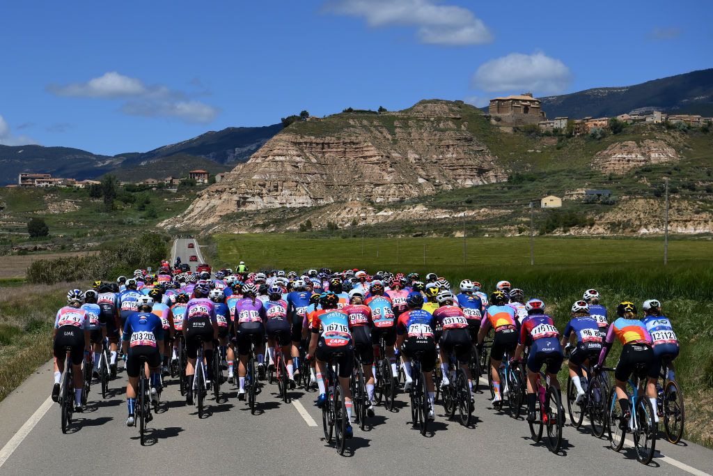 JACA SPAIN MAY 02 A general view of the peloton passing through a landscape during the 10th La Vuelta Femenina 2024 Stage 5 a 1139km stage from Huesca to Alto del Fuerte Rapitan Jaca 1103m UCIWWT on May 02 2024 in Jaca Spain Photo by Alex BroadwayGetty Images