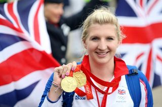 Rebecca Adlington shows off her two gold medals