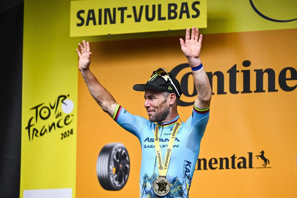 Briton Mark Cavendish of Astana Qazaqstan celebrates on the podium after winning stage 5 of the 2024 Tour de France cycling race, from Saint-Jean-de-Maurienne to Saint-Vulbas, France (177,4 km) on Wednesday 03 July 2024. The 111th edition of the Tour de France starts on Saturday 29 June and will finish in Nice, France on 21 July. BELGA PHOTO JASPER JACOBS (Photo by JASPER JACOBS / BELGA MAG / Belga via AFP)