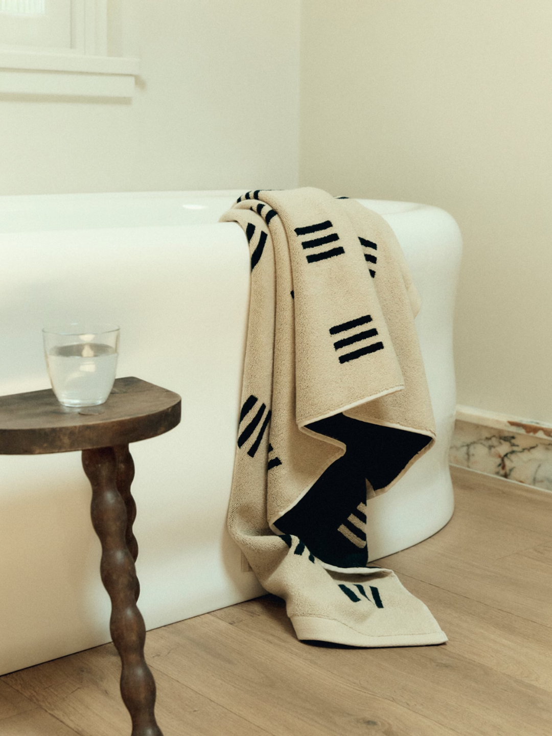 A minimalist patterned cotton weave claremont bath towel from Baina