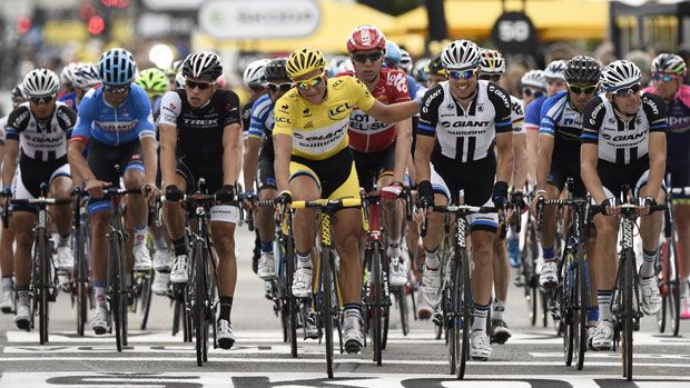 Riders cross the finish line at the end of the second stage in Sheffield