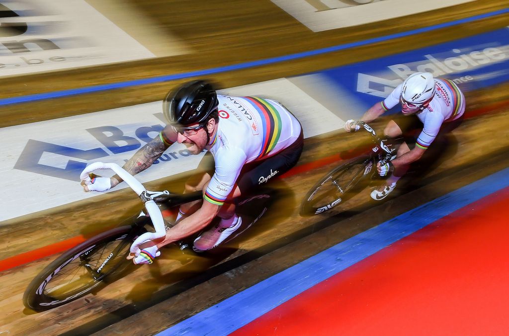 Bradley Wiggins and Mark Cavendish speed around the track