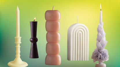 five candles of different shapes and sizes