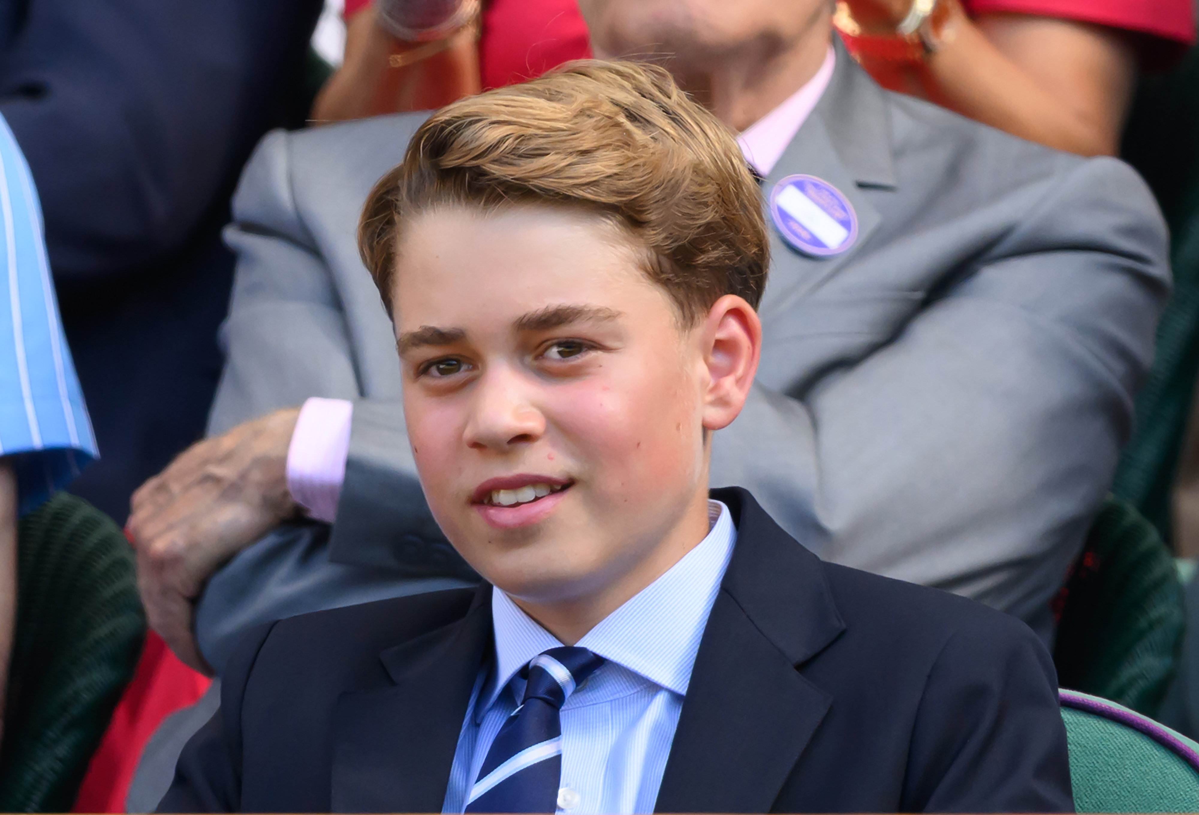 Prince George wearing a suit and tie