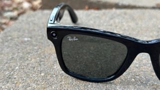A close-up of the Ray-Ban Meta smart glasses' right lens with LED active