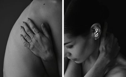 Model wearing rings in four fingers and wearing earring