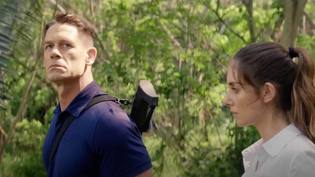 John Cena and Alison Brie as Mason and Claire in the jungle in Freelance