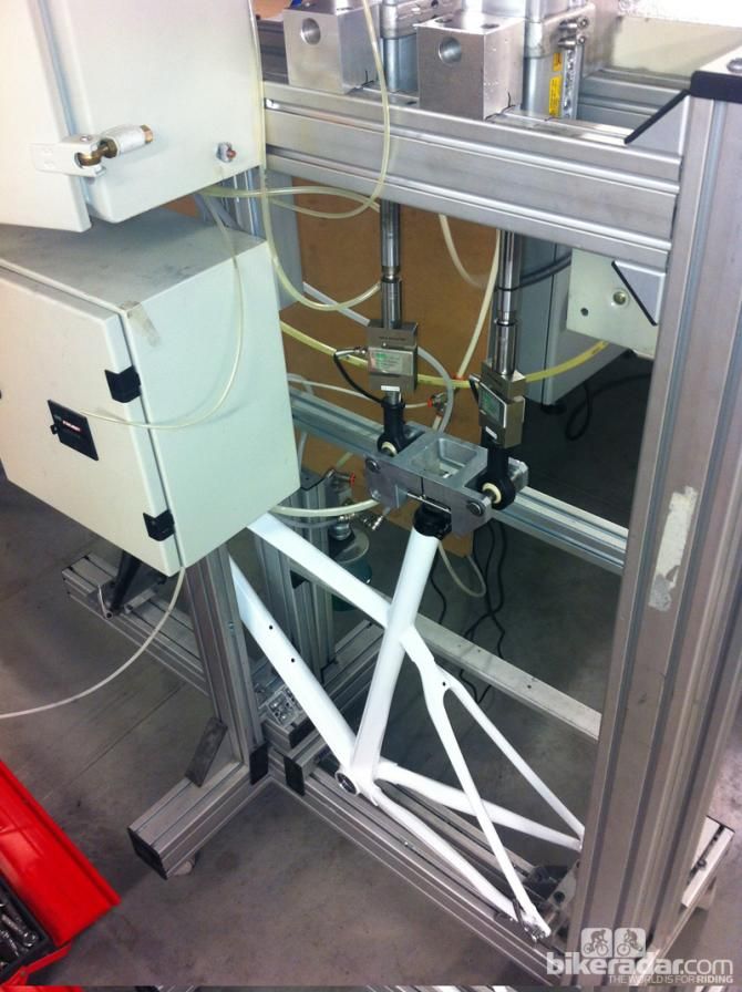QC testing as frames, bars and forks are pulled, pushed and stretched