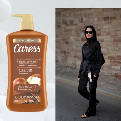A woman wearing black sunglasses as well as a black jacket, pants, shoes and a purse. She is next to 3 beauty products: blush, body wash, and perfume.