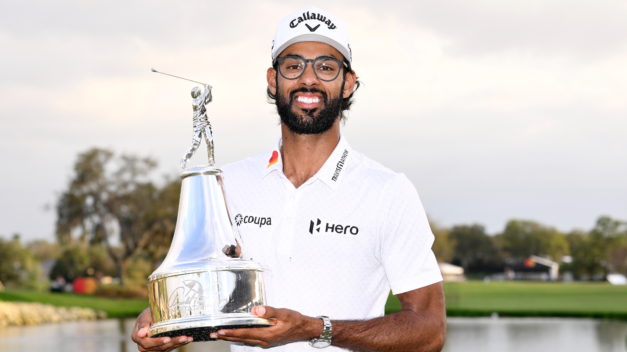 Akshay Bhatia with the Arnold Palmer Invitational trophy 