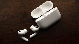 The Apple AirPods Pro on a black background