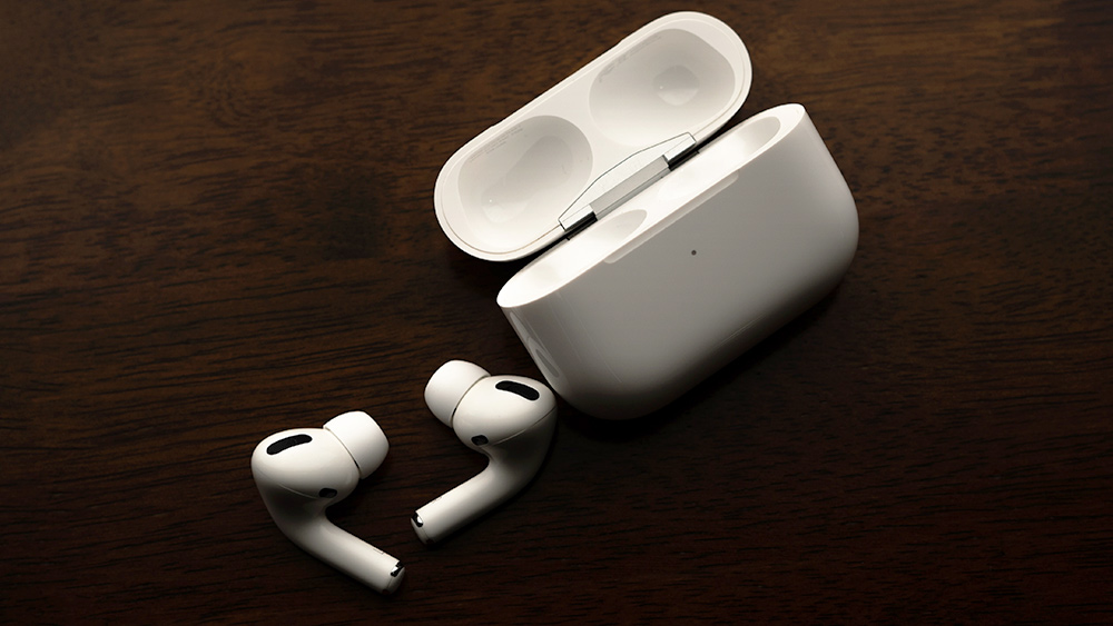 The Apple Air Pods Pro on a black background