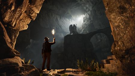Indy explores a cavern beneath Rome in Indiana Jones and the Great Circle: The Order of the Giants