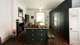 forest green shaker kitchen with large island