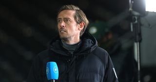 BT Sport pundit Peter Crouch looks on prior to the Premier League match between Fulham and Manchester City at Craven Cottage on March 13, 2021 in London, England. Sporting stadiums around the UK remain under strict restrictions due to the Coronavirus Pandemic as Government social distancing laws prohibit fans inside venues resulting in games being played behind closed doors.