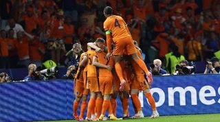 The Netherlands celebrate a goal against Turkey in their quarter-final